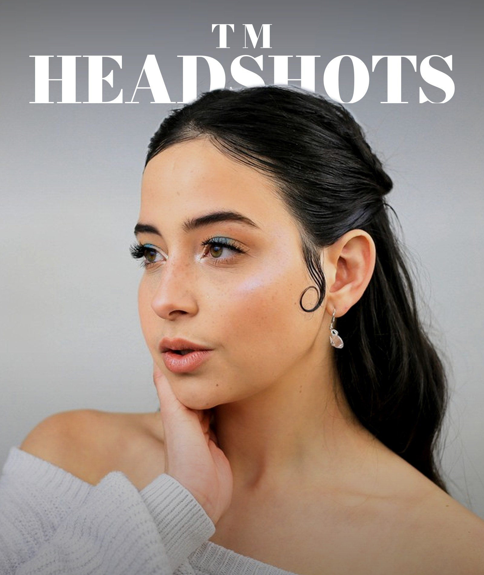 A TM Headshots portrait with the TM Headshots masthead behind her head